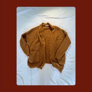 Thrifted orange cardigan